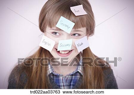 a girl with post-it notes all over her head View Large Photo Image Stock Image - a girl with post-it notes all over her head. Fotosearch