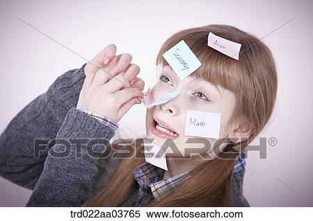 a girl with post-it notes all over her head View Large Photo Image Stock Photography - a girl with post-it notes all over her head. Fotosearch