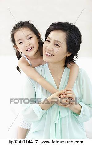 a grandmother and granddaughter together View Large Photo Image Stock Photo - a grandmother and granddaughter together. Fotosearch