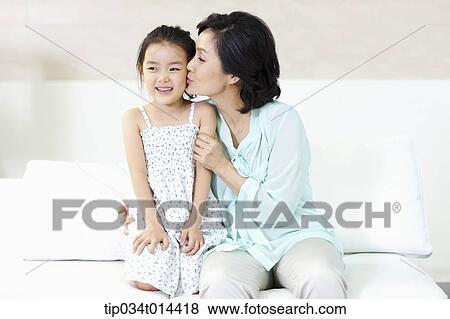 Stock Photo - a grandmother and granddaughter together. Fotosearch