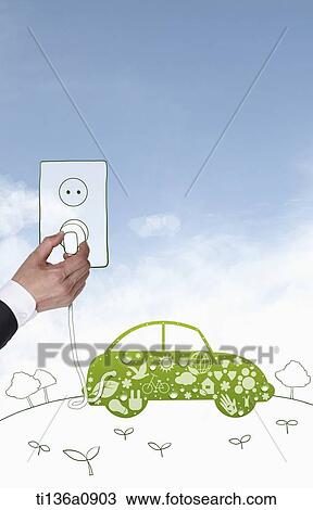 a hand plugging an illustrated electric car View Large Photo Image Stock Image - a hand plugging an illustrated electric car. Fotosearch