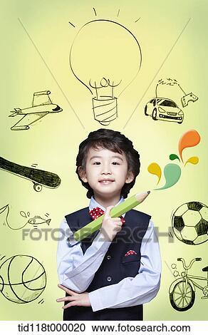 a kid holding a pencil View Large Photo Image Stock Image - a kid holding a pencil . Fotosearch