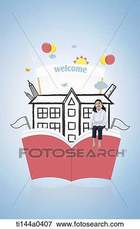 a kid sitting on a illustrated book in front of school View Large Photo Image Stock Photo - a kid sitting on a illustrated book in front of school. Fotosearch