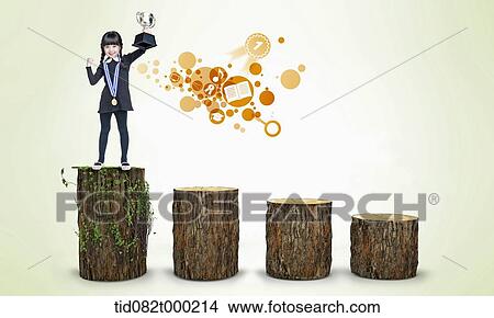 a kid with trophy standing on highest wood View Large Photo Image Picture - a kid with trophy standing on highest wood. Fotosearch