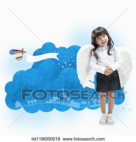 a kid with wings smiling View Large Photo Image Stock Photo - a kid with wings smiling. Fotosearch