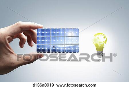 a light bulb powered by a solar panel View Large Photo Image Stock Photo - a light bulb powered by a solar panel. Fotosearch