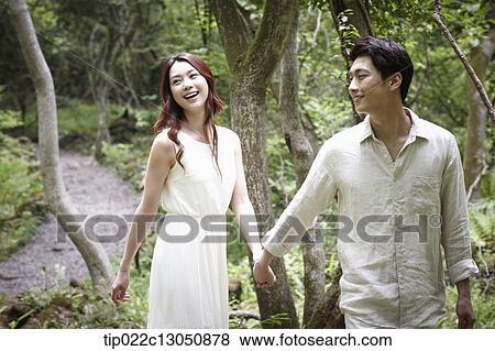 a man and a woman in the nature View Large Photo Image Stock Photo - a man and a woman in the nature. Fotosearch