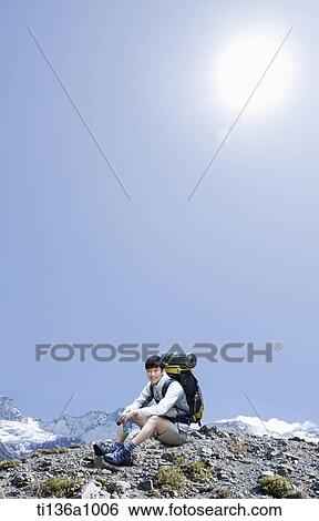 a man hiking in the mountains View Large Photo Image Stock Photograph - a man hiking in the mountains. Fotosearch