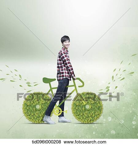 Stock Photo - a man with a bicycle made out of leaves . Fotosearch
