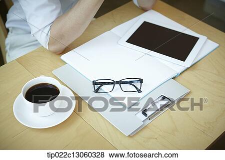 a man with a white shirt working View Large Photo Image Stock Photo - a man with a white shirt working. Fotosearch