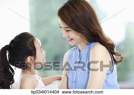 a mother and daughter playing together View Large Photo Image Picture - a mother and daughter playing together. Fotosearch