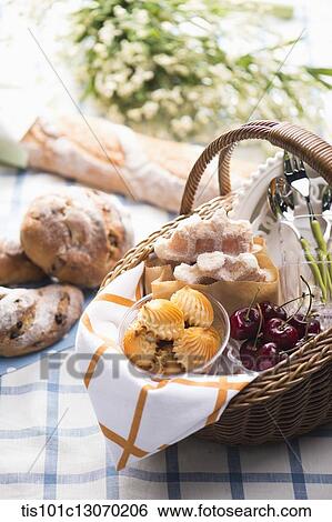 a picnic basket on a sheet View Large Photo Image Stock Photograph - a picnic basket on a sheet. Fotosearch