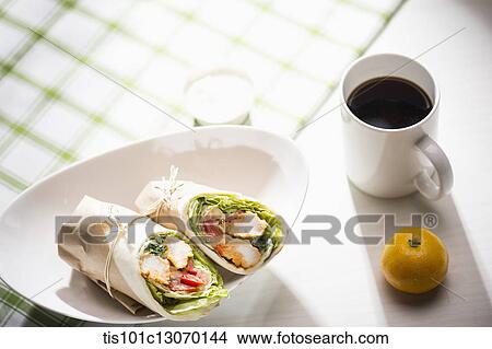 Picture - a picnic set spread out on a sheet. Fotosearch
