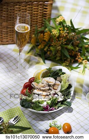 a picnic set spread out on a sheet View Large Photo Image Stock Image - a picnic set spread out on a sheet. Fotosearch