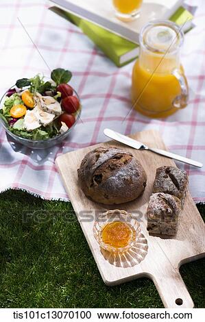 a picnic set spread out on a sheet View Large Photo Image Stock Image - a picnic set spread out on a sheet. Fotosearch