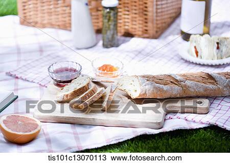 a picnic set spread out on a sheet View Large Photo Image Stock Image - a picnic set spread out on a sheet. Fotosearch