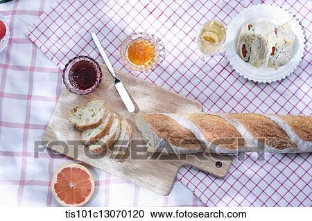 a picnic set spread out on a sheet View Large Photo Image Stock Image - a picnic set spread out on a sheet. Fotosearch