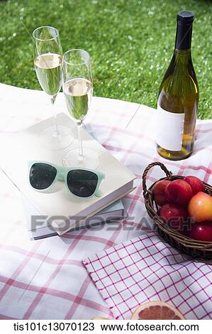 Stock Image - a picnic set spread out on a sheet. Fotosearch