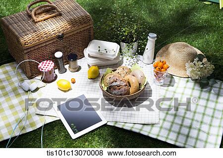 a picnic set spread out on a sheet View Large Photo Image Stock Photo - a picnic set spread out on a sheet. Fotosearch