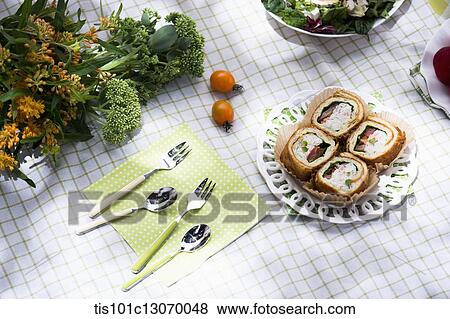 a picnic set spread out on a sheet View Large Photo Image Stock Photo - a picnic set spread out on a sheet. Fotosearch
