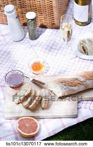 a picnic set spread out on a sheet View Large Photo Image Stock Photo - a picnic set spread out on a sheet. Fotosearch