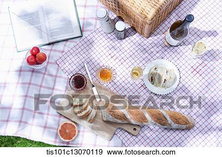 a picnic set spread out on a sheet View Large Photo Image Stock Photo - a picnic set spread out on a sheet. Fotosearch