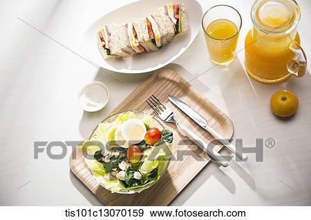 a picnic set spread out on a sheet View Large Photo Image Stock Photo - a picnic set spread out on a sheet. Fotosearch