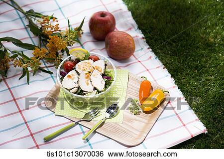 a picnic set spread out on a sheet View Large Photo Image Stock Photograph - a picnic set spread out on a sheet. Fotosearch