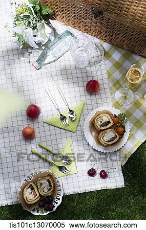 a picnic set spread out on a sheet View Large Photo Image Stock Photography - a picnic set spread out on a sheet. Fotosearch