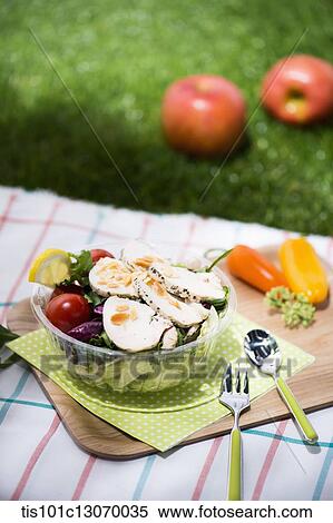 a picnic set spread out on a sheet View Large Photo Image Stock Photography - a picnic set spread out on a sheet. Fotosearch