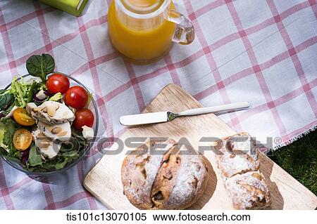 Stock Photography - a picnic set spread out on a sheet. Fotosearch