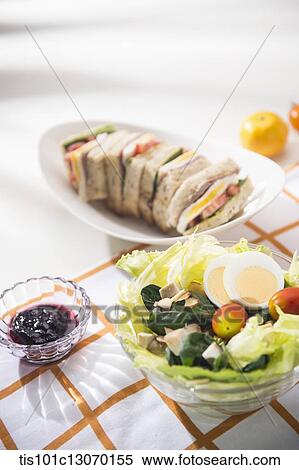 a picnic set spread out on a sheet View Large Photo Image Stock Photography - a picnic set spread out on a sheet. Fotosearch