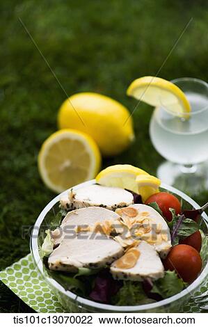 a picnic set spread out on the grass View Large Photo Image Stock Image - a picnic set spread out on the grass. Fotosearch