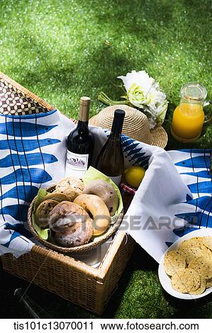 a picnic set with wine and bagels View Large Photo Image Stock Image - a picnic set with wine and bagels. Fotosearch