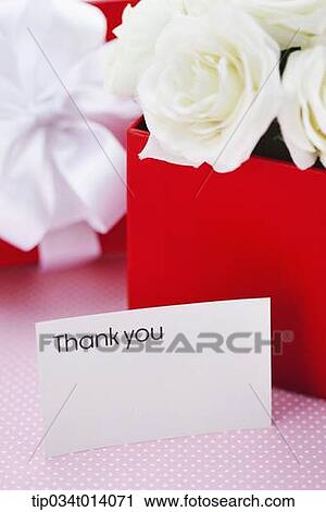 a thank you note in front of box filled with flowers View Large Photo Image Stock Image - a thank you note in front of box filled with flowers. Fotosearch