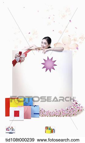 a woman behind a gift box View Large Photo Image Stock Photo - a woman behind a gift box. Fotosearch