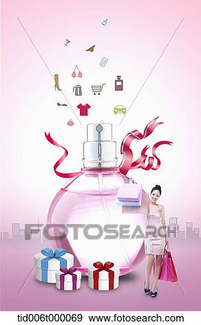 a woman in dress standing next to a huge perfume View Large Photo Image Stock Photo - a woman in dress standing next to a huge perfume . Fotosearch