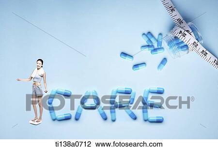 Stock Image - a woman standing next to the word care. Fotosearch