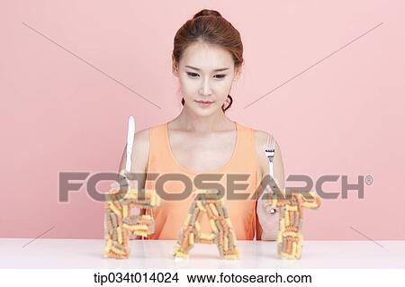 Picture - a woman with a word fat in front of her. Fotosearch