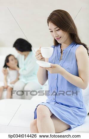 a woman with daughter and grand daughter in the room View Large Photo Image Stock Photograph - a woman with daughter and grand daughter in the room. Fotosearch