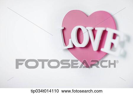 a word love on pink heart shape View Large Photo Image Stock Image - a word love on pink heart shape. Fotosearch