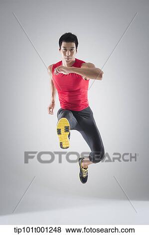 an athlete jumping View Large Photo Image Stock Photo - an athlete jumping . Fotosearch