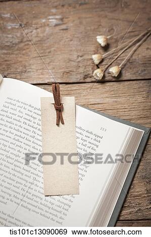an open book on wooden desk View Large Photo Image Stock Photo - an open book on wooden desk. Fotosearch
