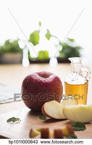 apples next to a juice pot View Large Photo Image Stock Image - apples next to a juice pot. Fotosearch