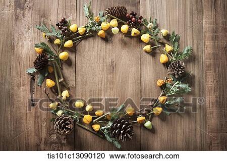 autumn plants as wreath on wooden surface View Large Photo Image Stock Image - autumn plants as wreath on wooden surface. Fotosearch