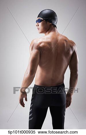 back shot of a fit man with swimming goggle and hat View Large Photo Image Stock Photography - back shot of a fit man with swimming goggle and hat. Fotosearch