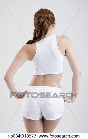 back shot of a woman with healthy body posing View Large Photo Image Stock Photo - back shot of a woman with healthy body posing. Fotosearch