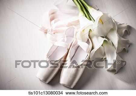 ballet shoes and bundle of flowers View Large Photo Image Picture - ballet shoes and bundle of flowers. Fotosearch