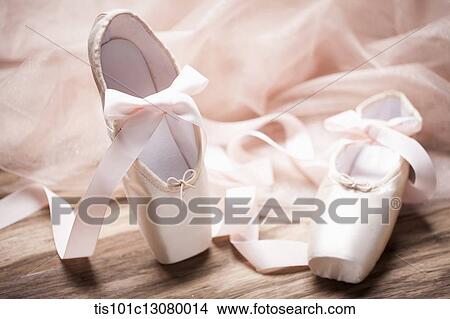 Picture - ballet shoes on a wooden floor. Fotosearch