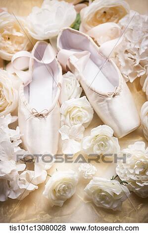 ballet shoes on flowers with bright lights View Large Photo Image Stock Photo - ballet shoes on flowers with bright lights. Fotosearch